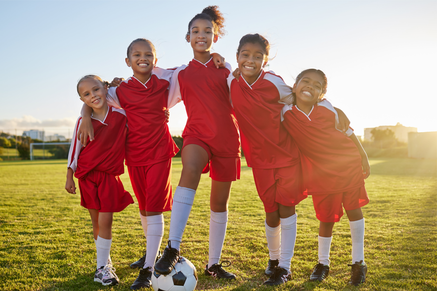 Girls soccer team during half-time