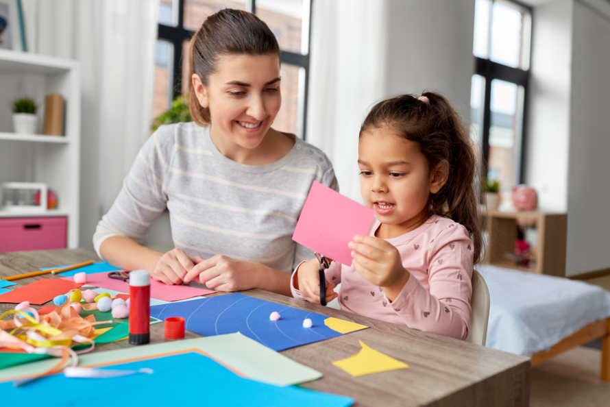 little girl creating arts and crafts